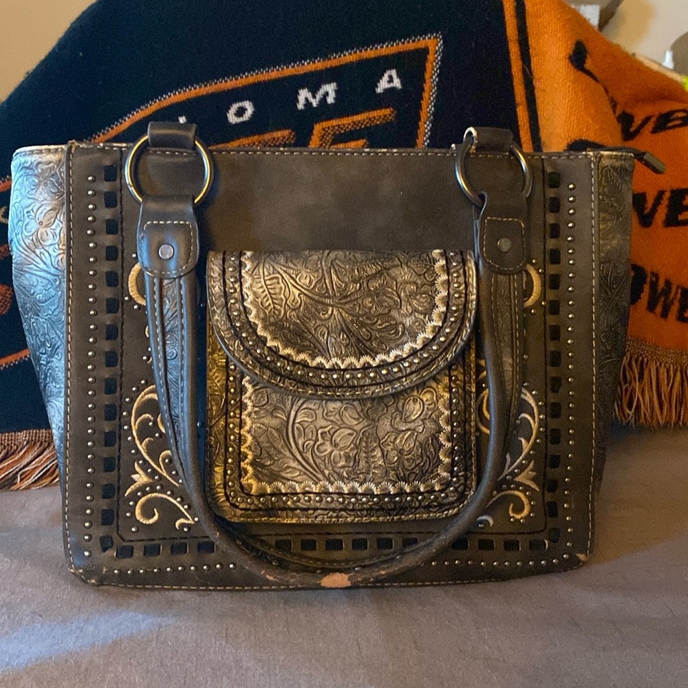 Montana West purse with faults but still has lots of life